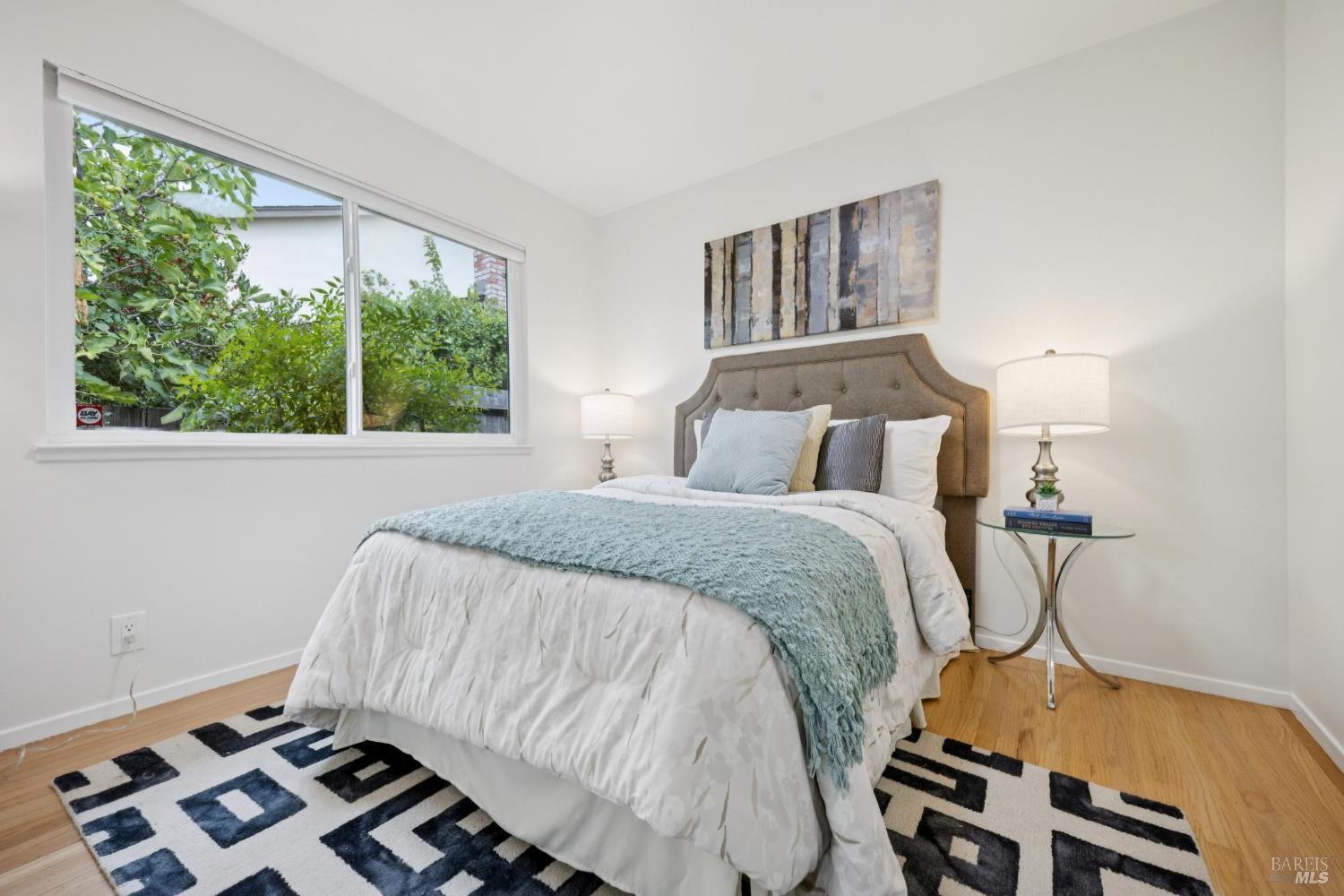 934 Las Pavadas Avenue San Rafael, CA 94903 - Photo 26 of 36 a bedroom with a bed and a window