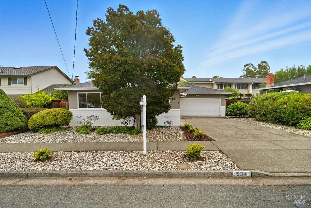 934 Las Pavadas Avenue San Rafael, CA 94903 - Photo 28 of 36 a front view of a house with a yard