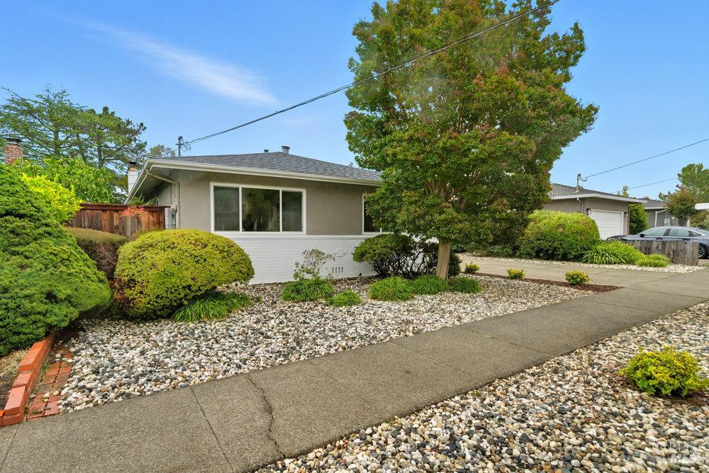 934 Las Pavadas Avenue San Rafael, CA 94903 - Photo 30 of 36 a front view of a house with a garden