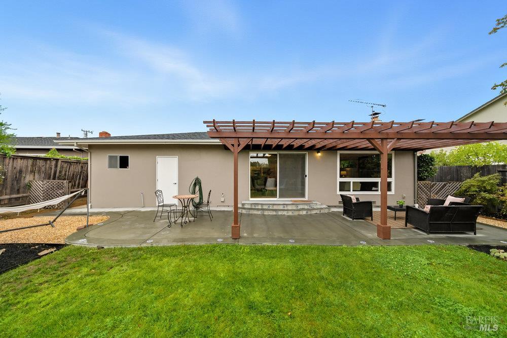 934 Las Pavadas Avenue San Rafael, CA 94903 - Photo 33 of 36 a view of a house with backyard porch and sitting area