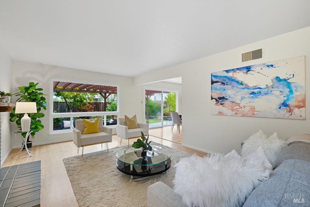 934 Las Pavadas Avenue San Rafael, CA 94903 - Photo 10 of 36 a living room with furniture and a large window