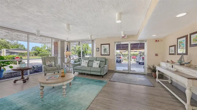 a living room with furniture and a table