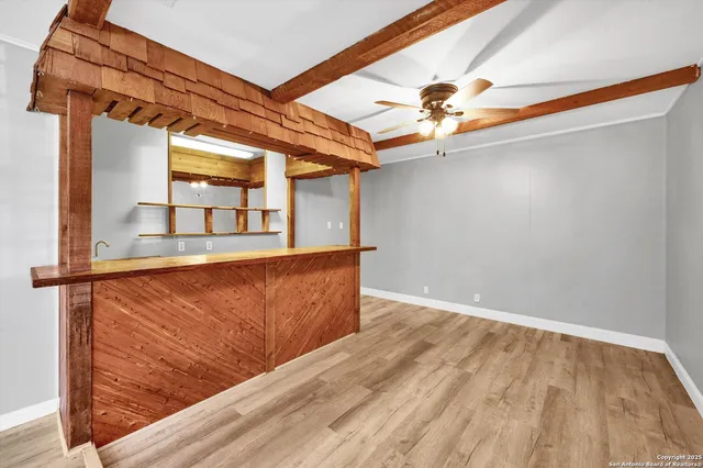 view of room with window and wooden floor