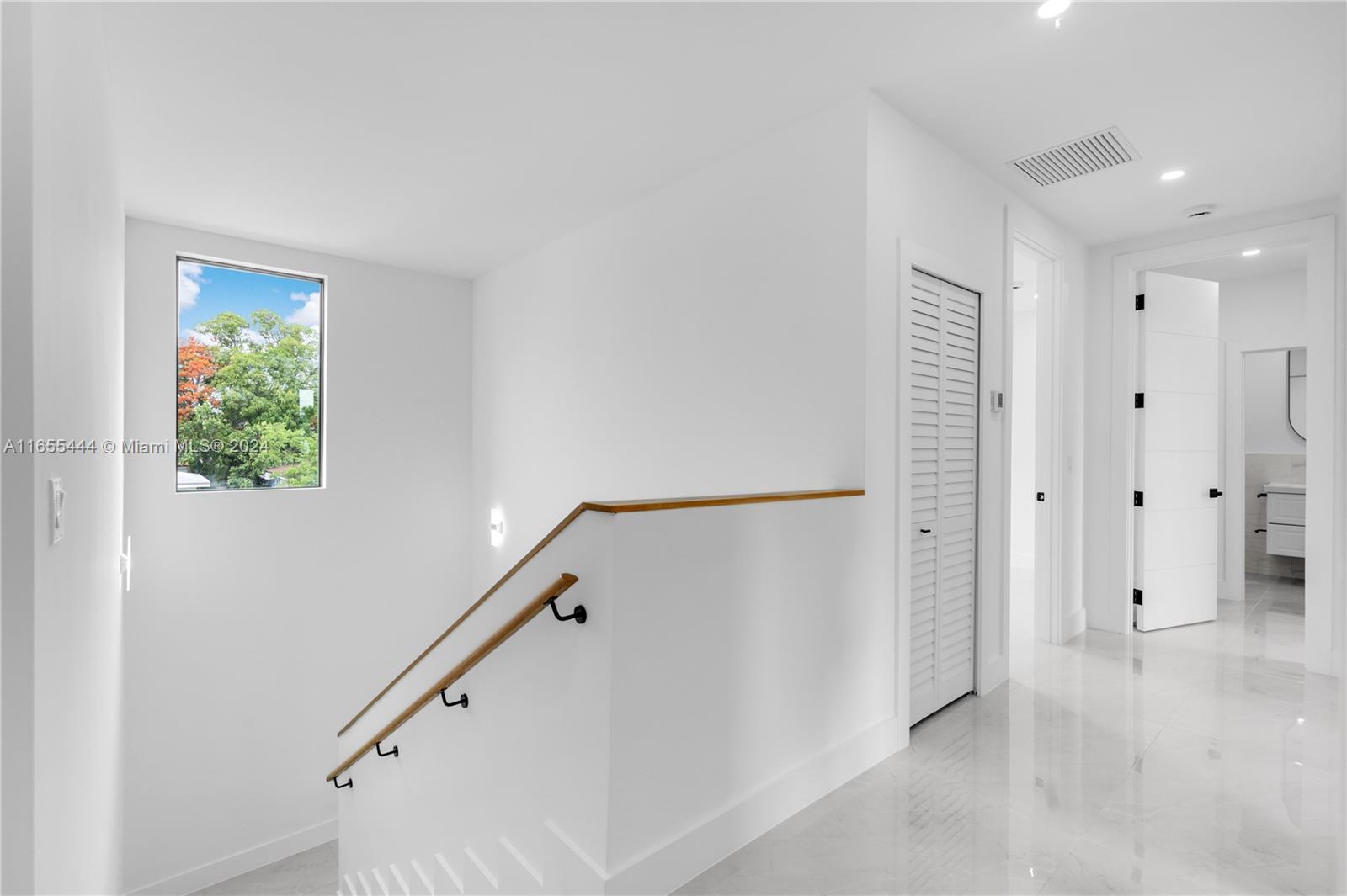 2340 Southwest 13th Street, Unit 2340 Miami, FL 33145 - Photo 12 of 26 a view of entryway with wooden floor
