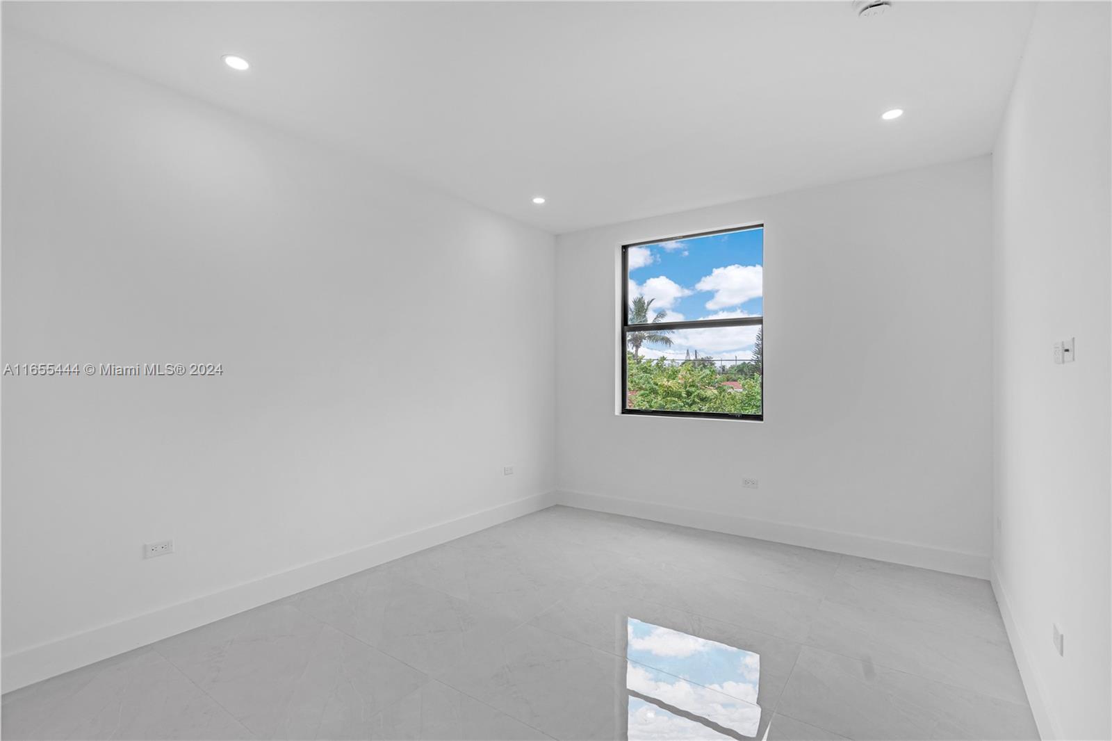 2340 Southwest 13th Street, Unit 2340 Miami, FL 33145 - Photo 23 of 26 an empty room with windows