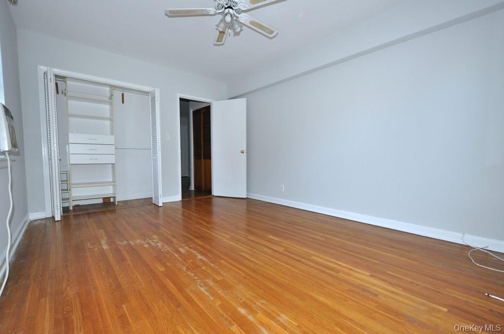 142 Garth Road, Unit 2N Scarsdale, NY 10583 - Photo 15 of 32 Large corner bedroom has two closest and hardwood floors. The bedroom is 15'-4" x 11'-4".