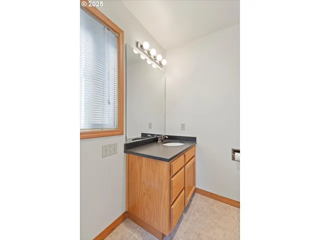 a view of a kitchen with washer and dryer