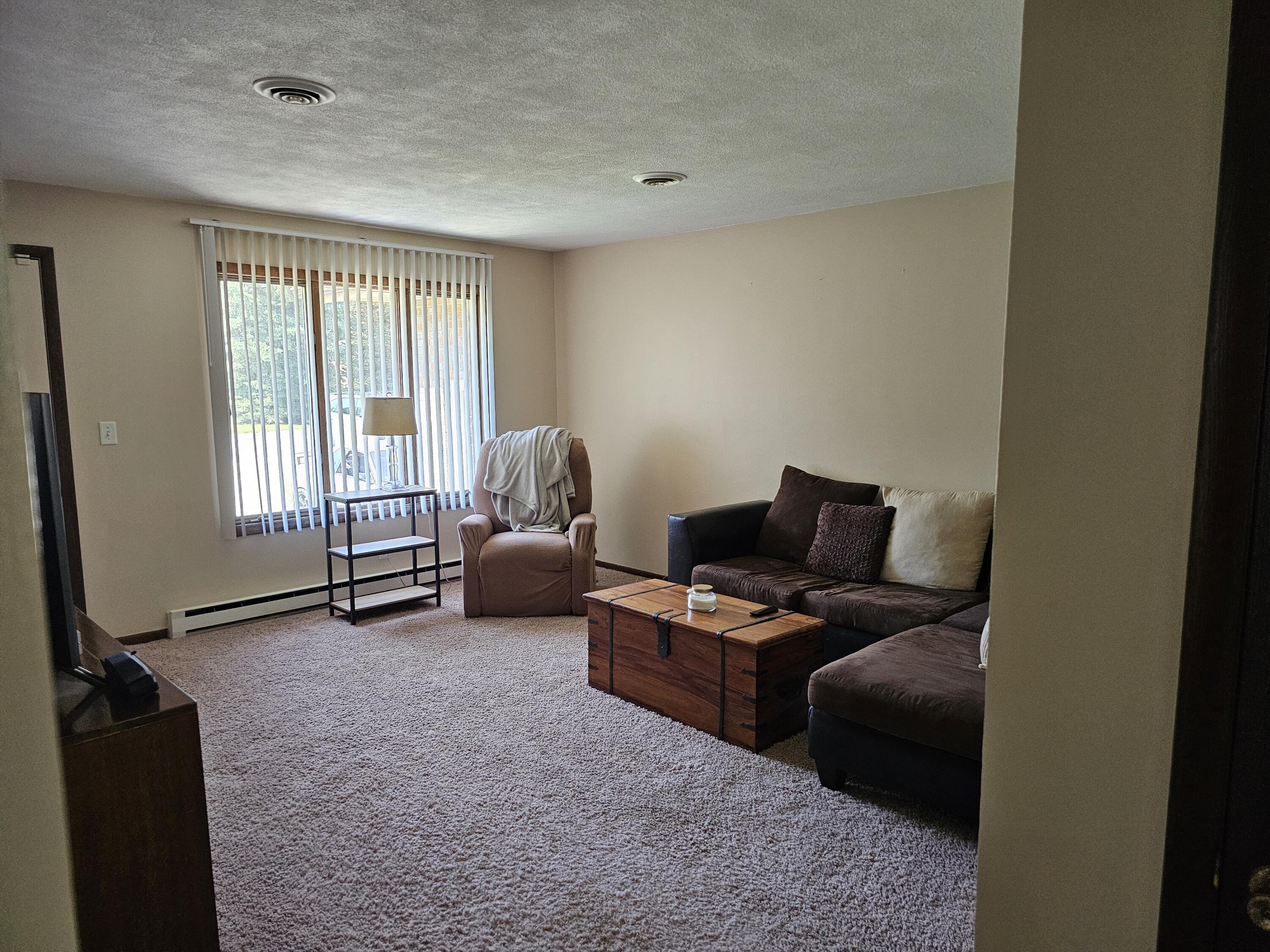 1605-1609 Pheasant Run Baroda, MI 49101 - Photo 3 of 23 living room right