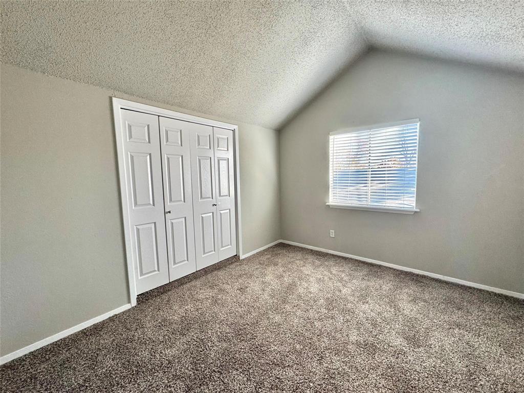 2508 South Center Street Arlington, TX 76014 - Photo 11 of 17 an empty room with windows