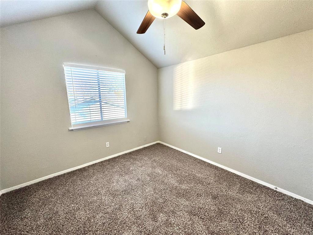 2508 South Center Street Arlington, TX 76014 - Photo 14 of 17 an empty room with a window