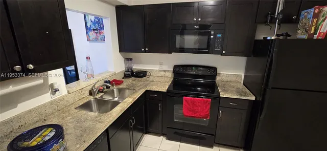 $161,500 | 1830 Dixianna Street, Unit 203, Hollywood, FL 33020
