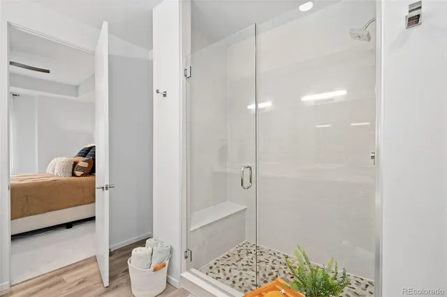 a bathroom with a tub and a shower