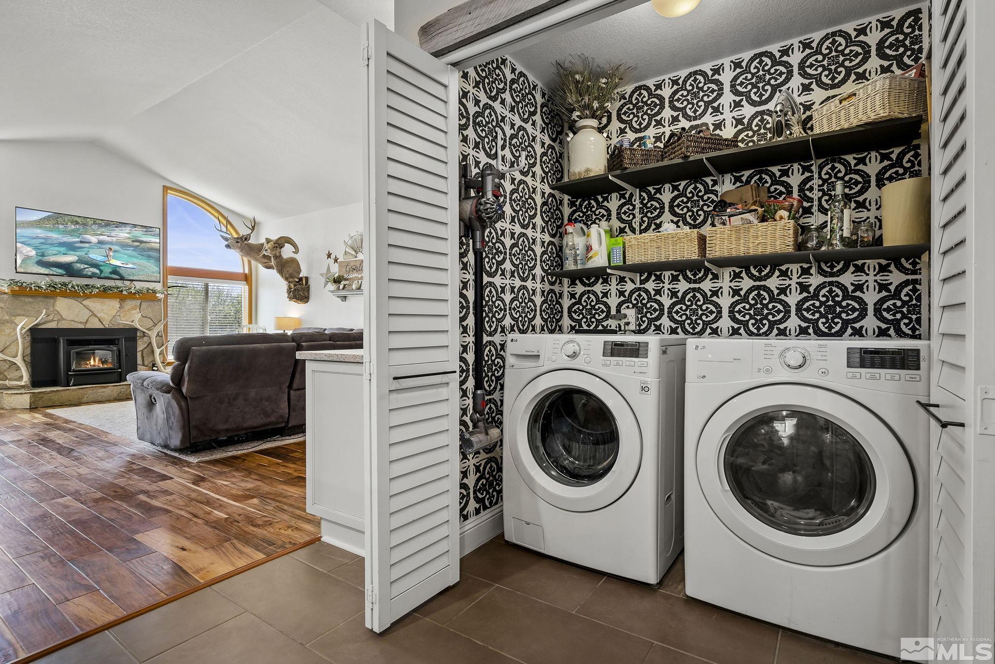11090 Wagon Ho Lane Reno, NV 89508 - Photo 13 of 33 a utility room with dryer and washer