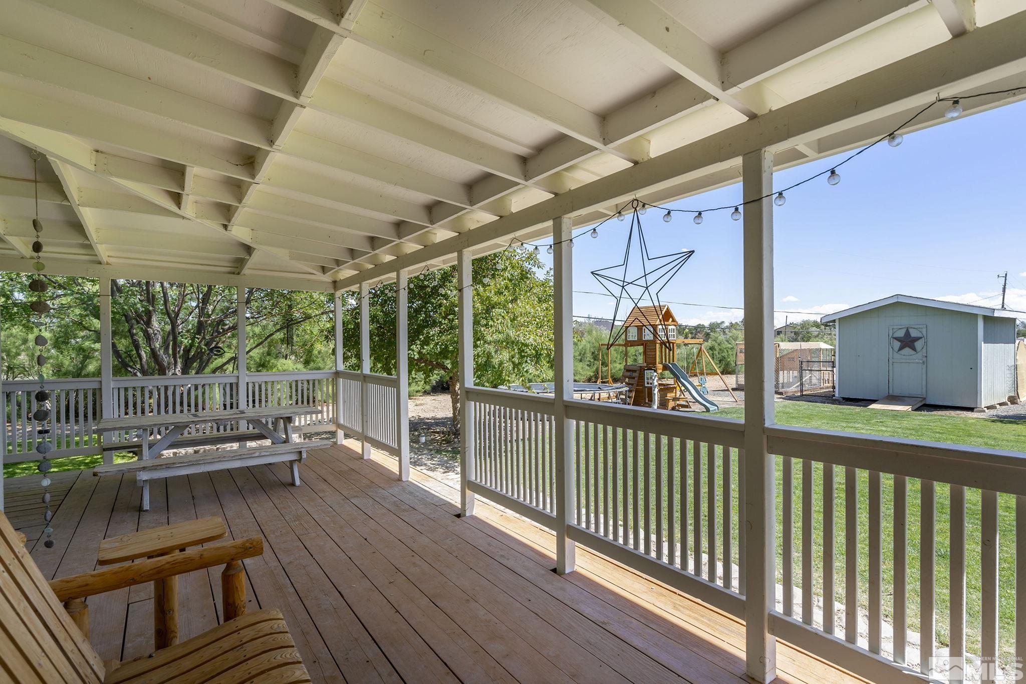 11090 Wagon Ho Lane Reno, NV 89508 - Photo 21 of 33 a view of a porch with furniture and a yard