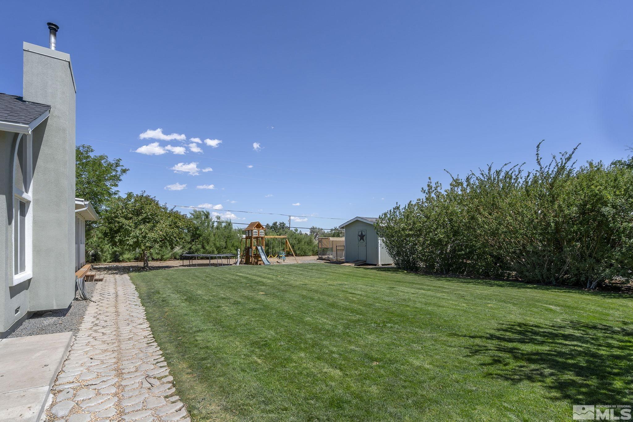 11090 Wagon Ho Lane Reno, NV 89508 - Photo 23 of 33 a view of a golf course with a garden
