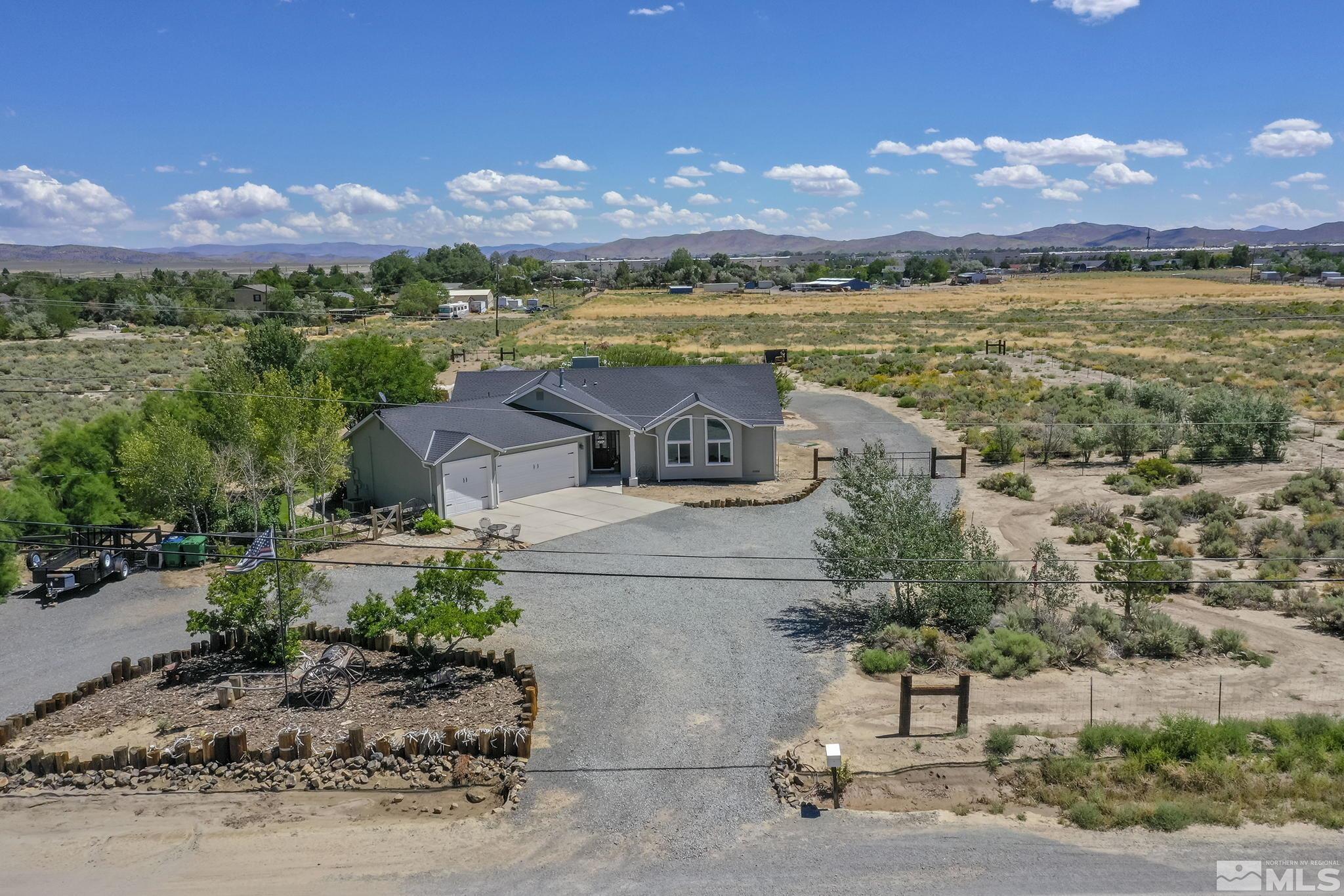 11090 Wagon Ho Lane Reno, NV 89508 - Photo 30 of 33 a view of a lake with a terrace with seating space