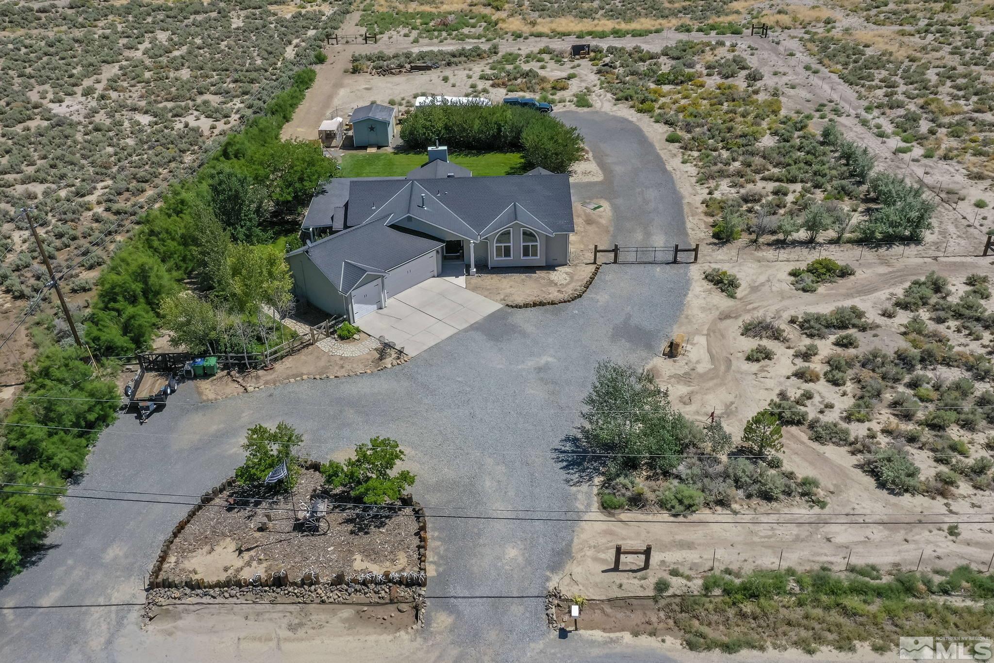 11090 Wagon Ho Lane Reno, NV 89508 - Photo 3 of 33 an aerial view of a house with a yard