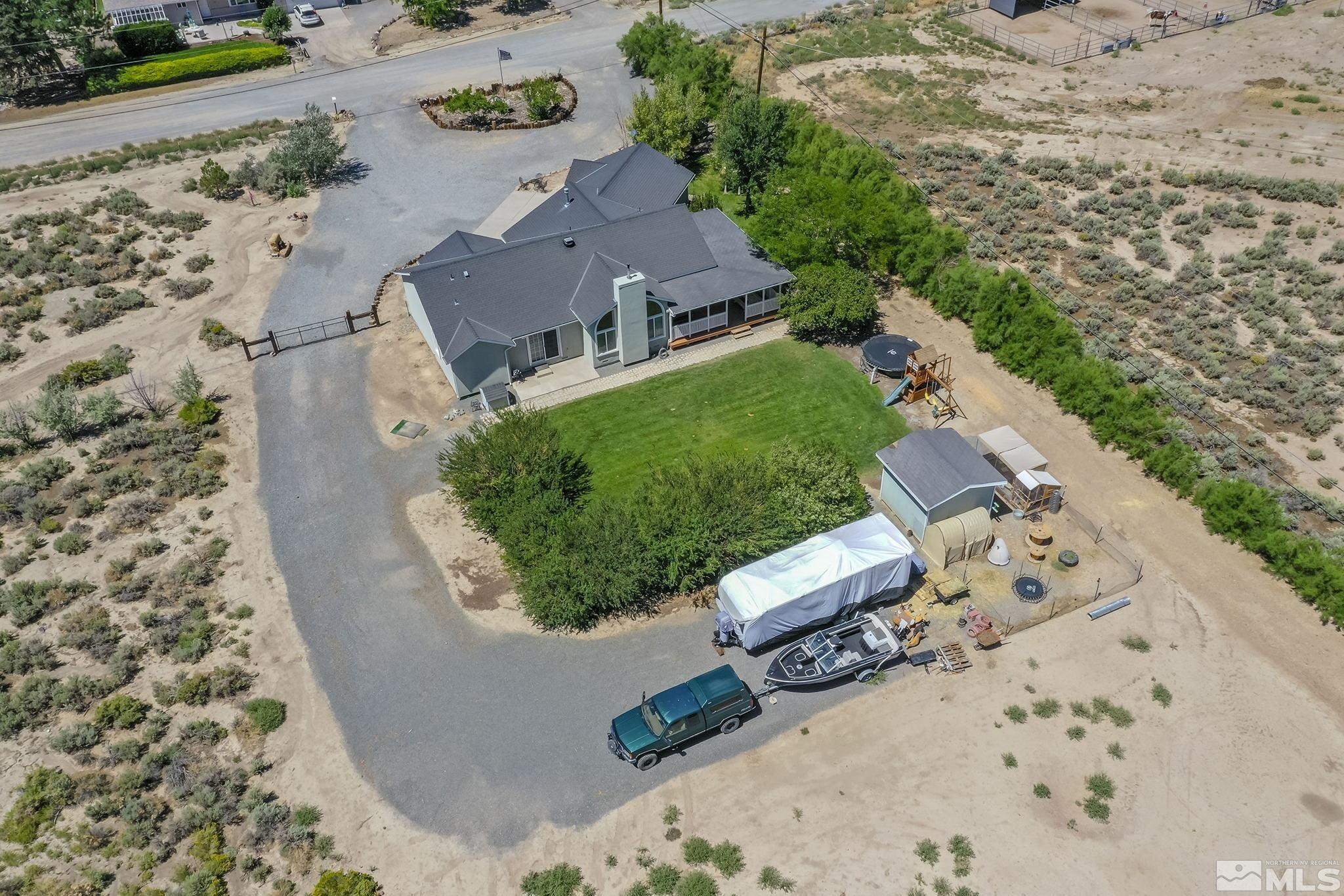 11090 Wagon Ho Lane Reno, NV 89508 - Photo 33 of 33 an aerial view of a house with a yard