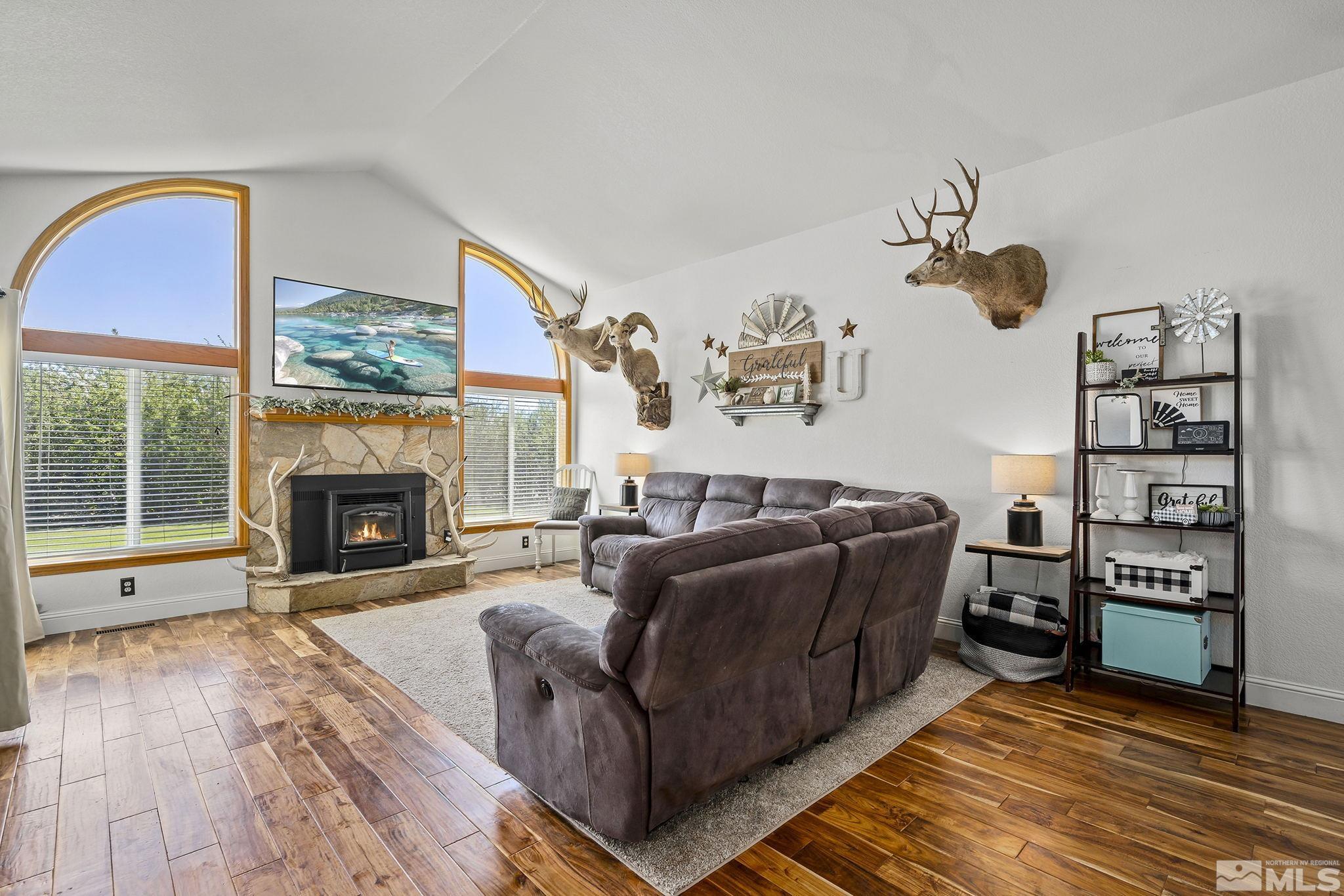 11090 Wagon Ho Lane Reno, NV 89508 - Photo 5 of 33 a living room with furniture and a fireplace