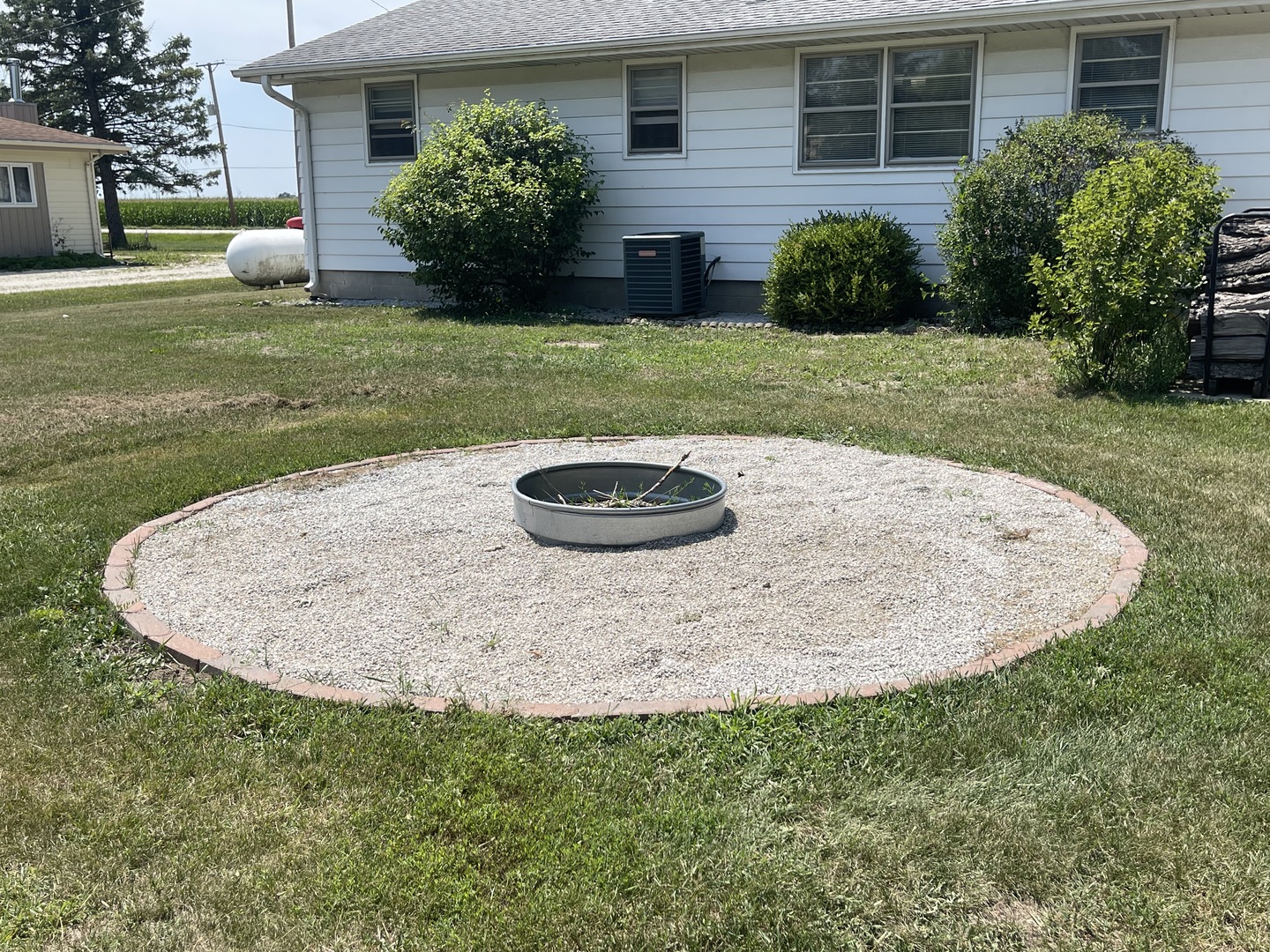 2775 Highway 115 Kankakee, IL 60901 - Photo 7 of 8 a view of a house with a backyard