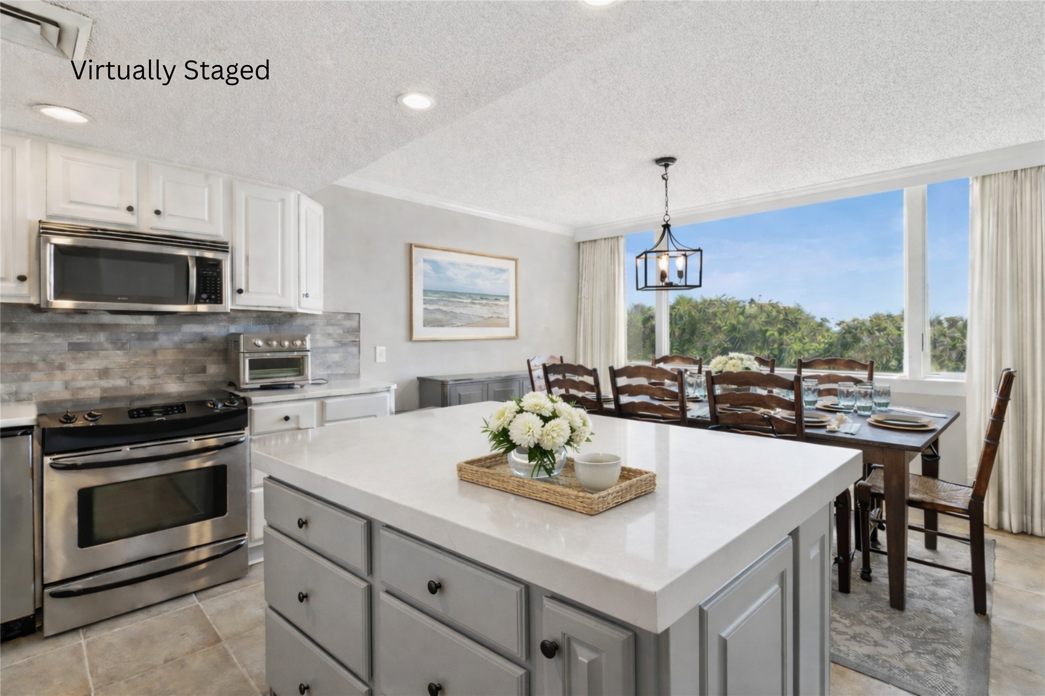 1165 Beach Walker Road, Unit 1165 Fernandina Beach, FL 32034 - Photo 11 of 45 a kitchen with a sink a stove and chairs