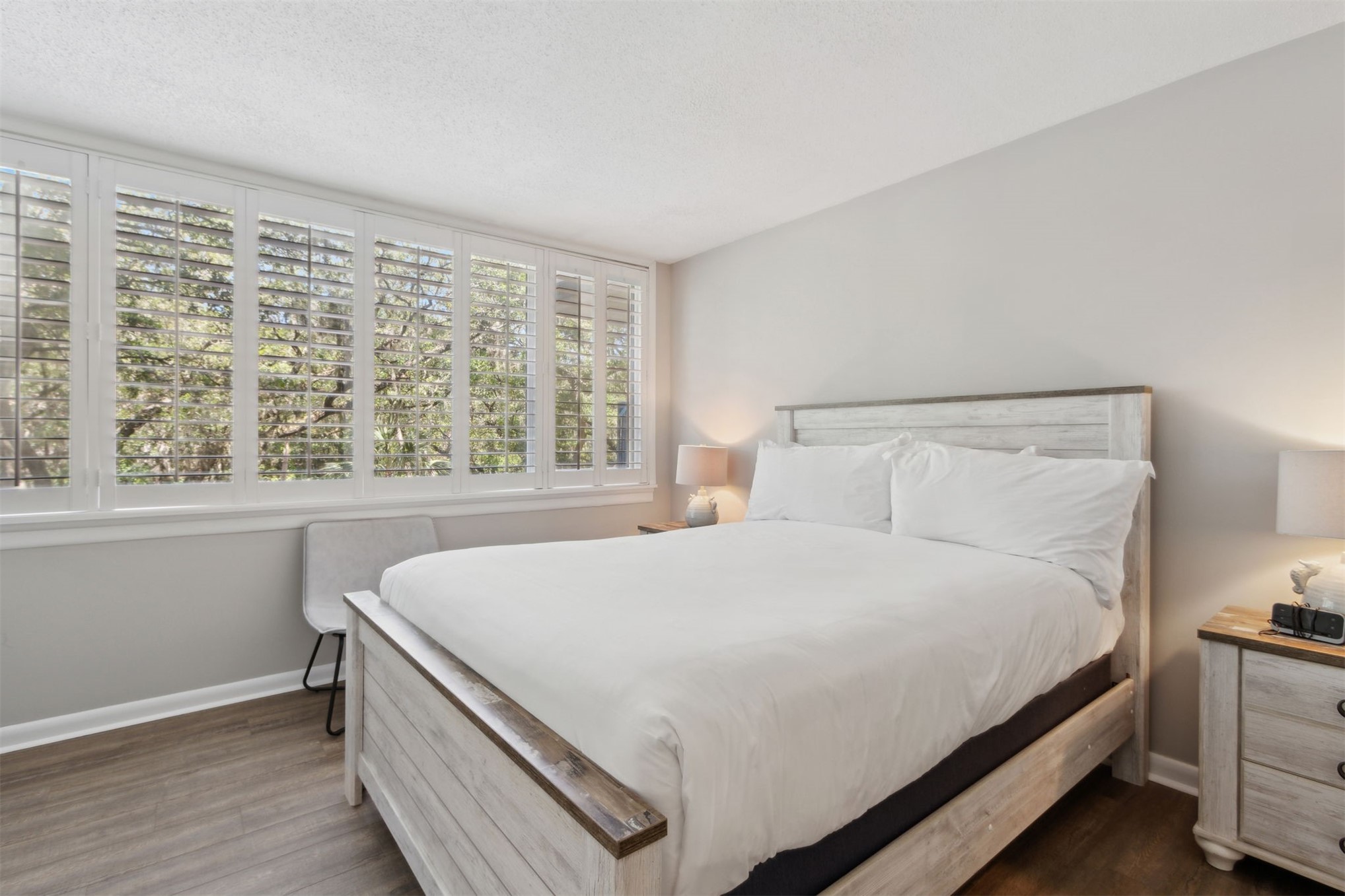 1165 Beach Walker Road, Unit 1165 Fernandina Beach, FL 32034 - Photo 15 of 45 a large bed sitting in a bedroom next to a window