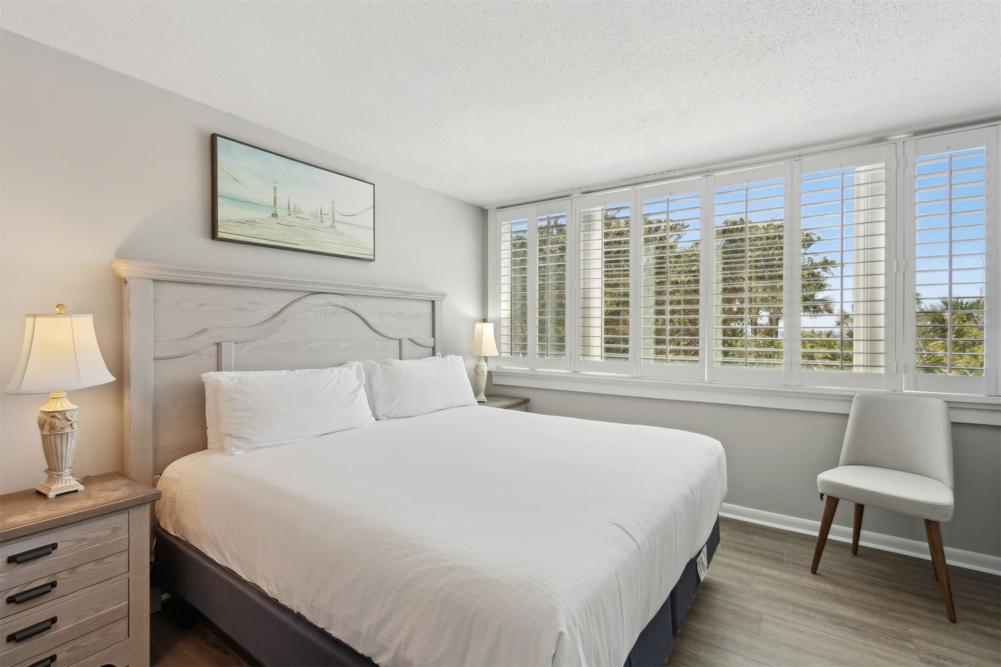 1165 Beach Walker Road, Unit 1165 Fernandina Beach, FL 32034 - Photo 20 of 45 a bedroom with a large bed and a large window