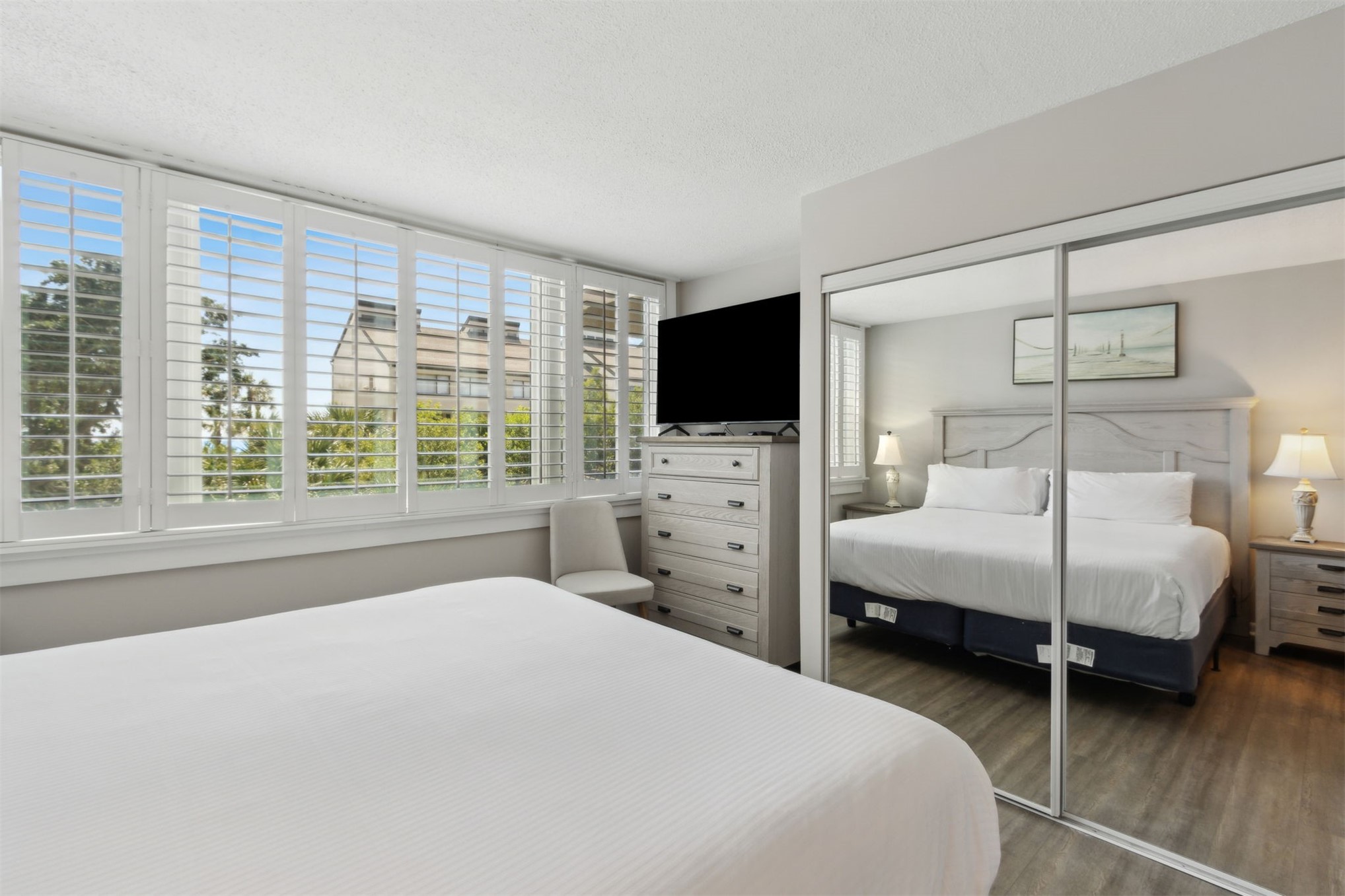 1165 Beach Walker Road, Unit 1165 Fernandina Beach, FL 32034 - Photo 22 of 45 a bedroom with a bed and a flat screen tv