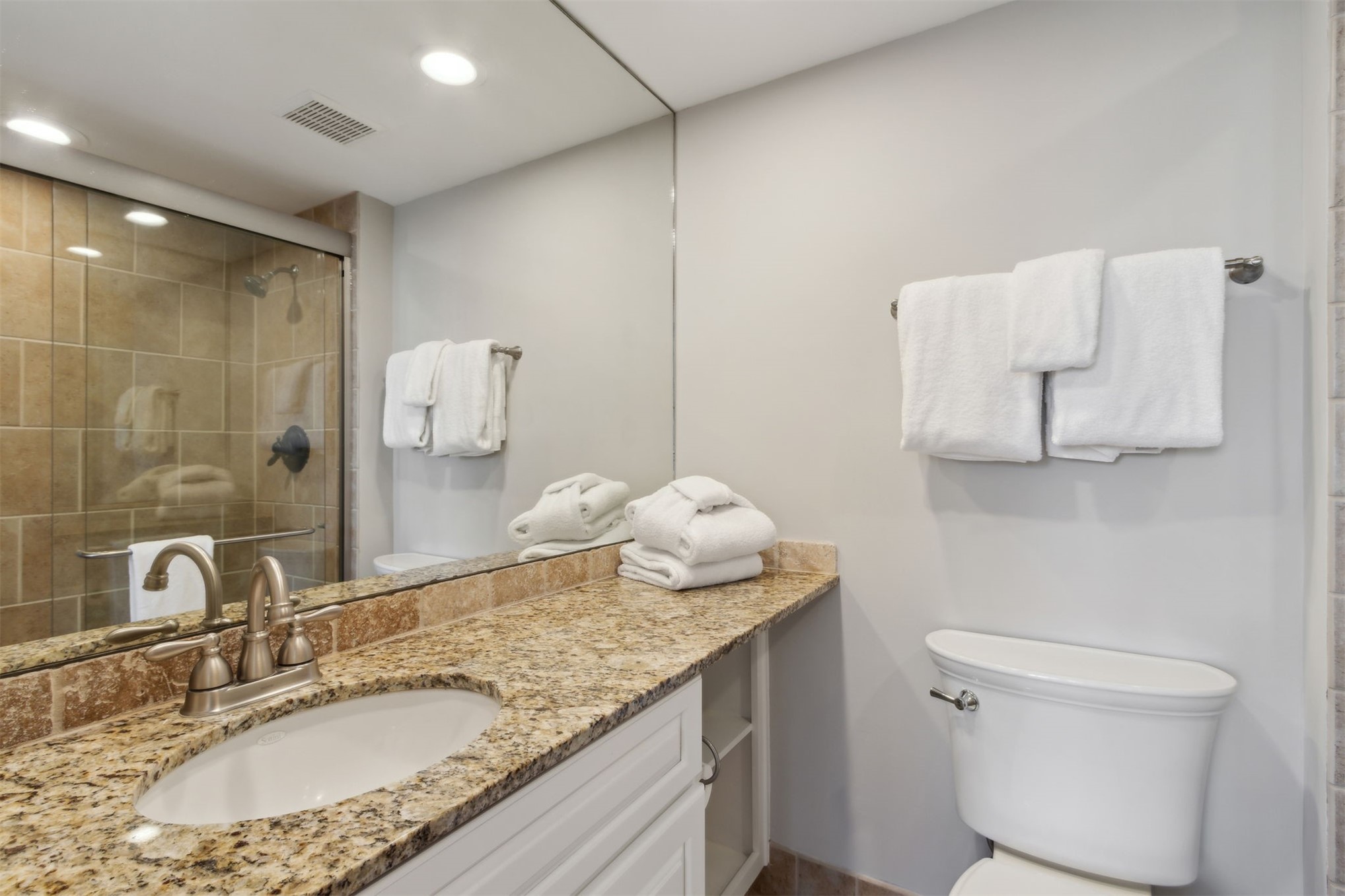 1165 Beach Walker Road, Unit 1165 Fernandina Beach, FL 32034 - Photo 23 of 45 a bathroom with a granite countertop sink a toilet and shower