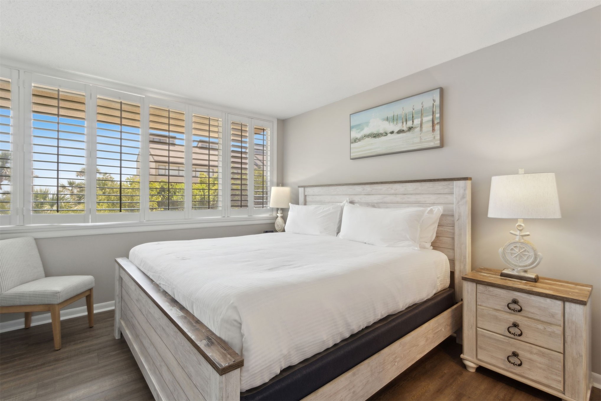 1165 Beach Walker Road, Unit 1165 Fernandina Beach, FL 32034 - Photo 24 of 45 a bedroom with a bed and a night stand