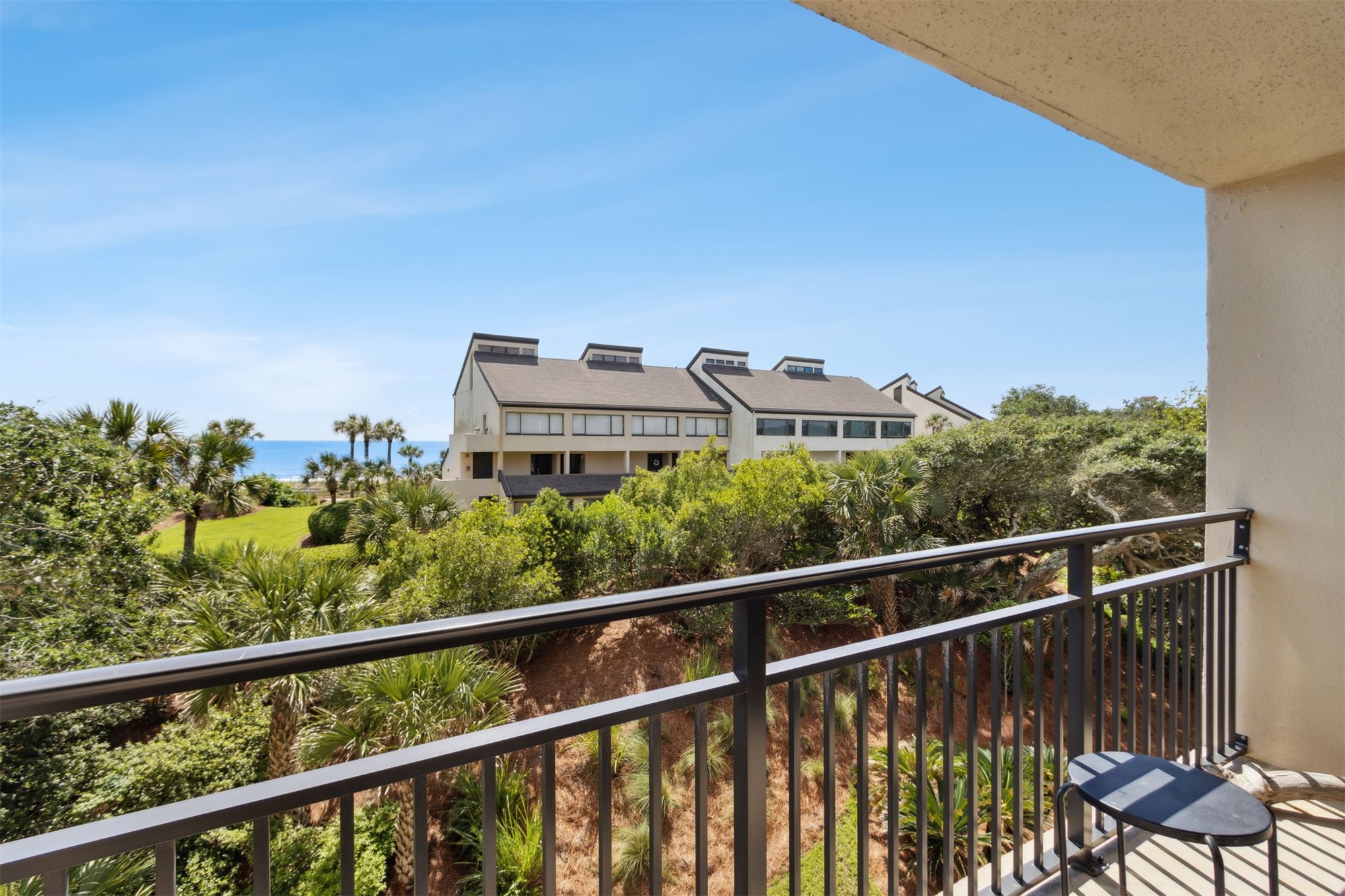 1165 Beach Walker Road, Unit 1165 Fernandina Beach, FL 32034 - Photo 29 of 45 a view of a balcony with chairs