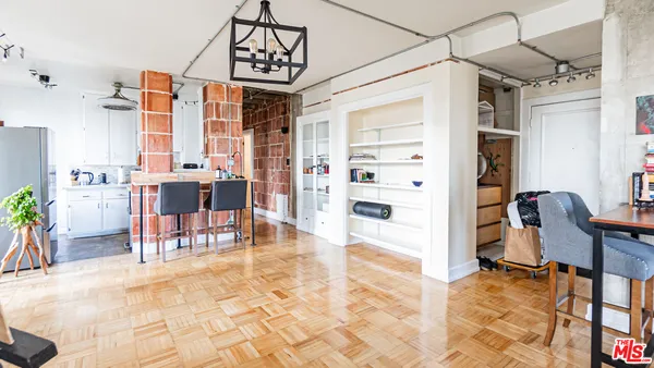 a view of a livingroom with furniture and furniture