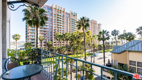 a view of balcony and a swimming pool