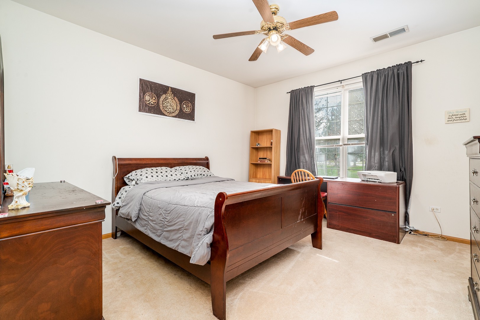 24100 Pear Tree Circle Plainfield, IL 60585 - Photo 8 of 13 a spacious bedroom with a bed and window