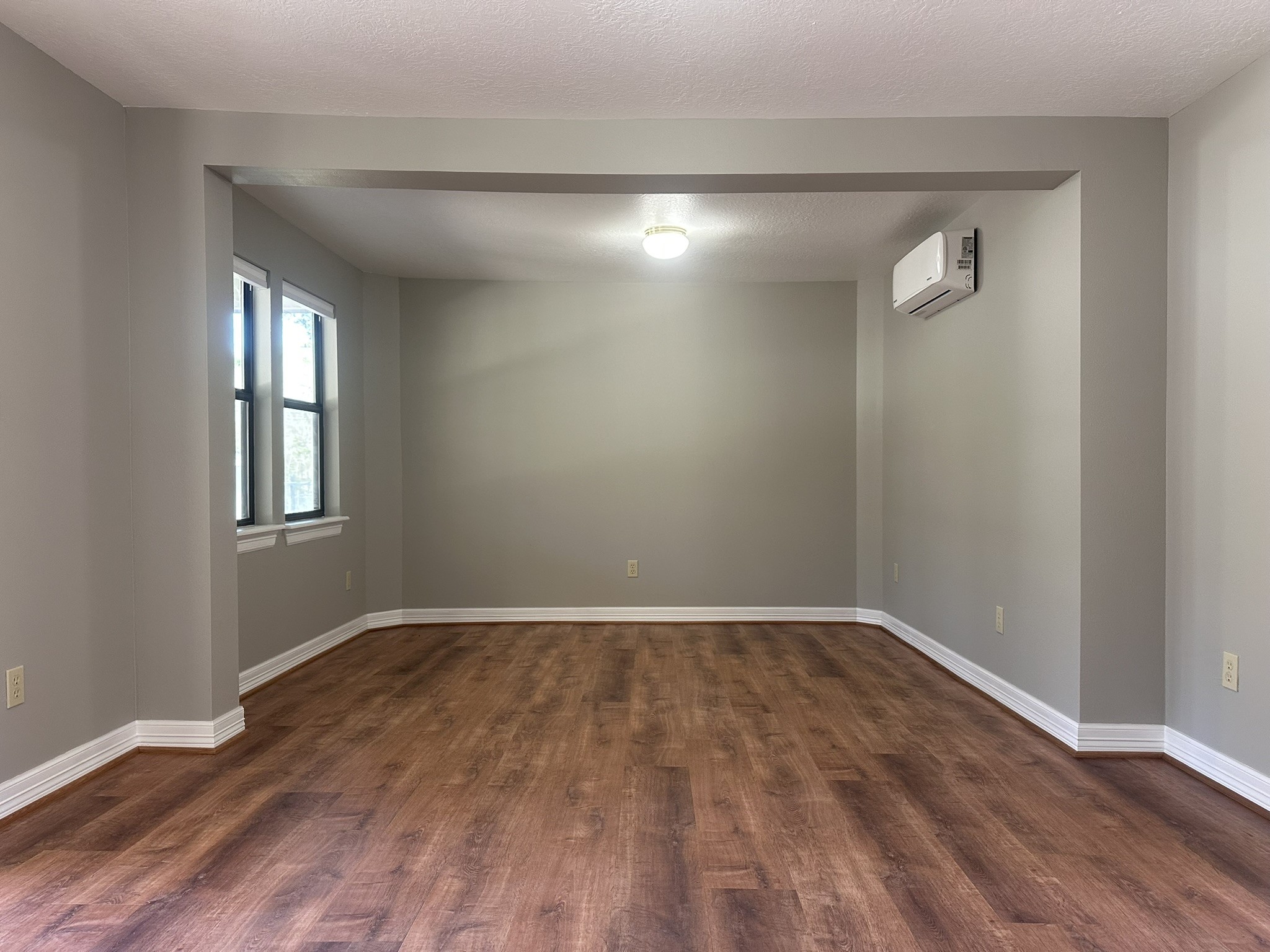 13868 Cedar Hill Road Montgomery, TX 77356 - Photo 12 of 19 a view of an empty room with wooden floor and a window