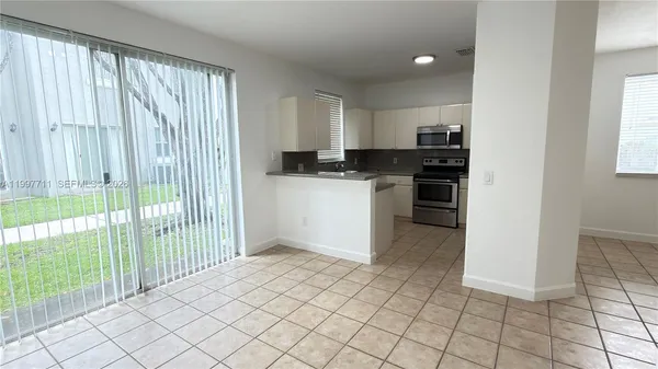 a view of an empty room with window