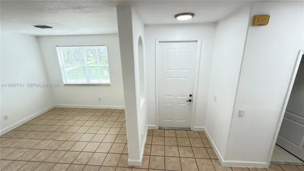 a bathroom with a tub and a shower