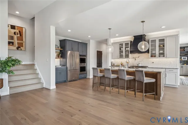 a view of dining table chairs and entryway