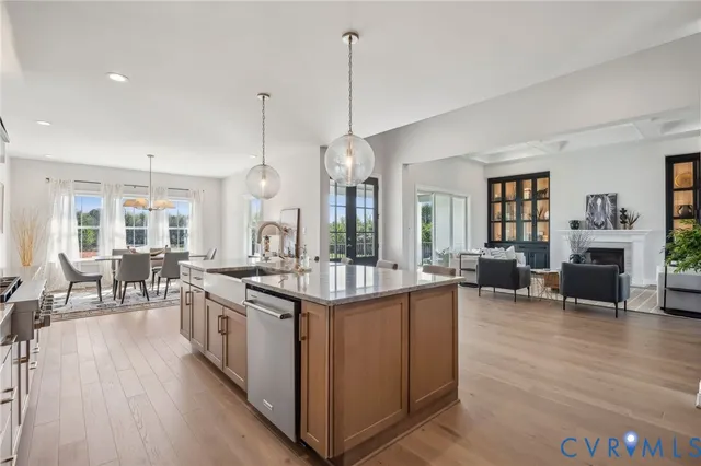 a kitchen with stove and cabinets