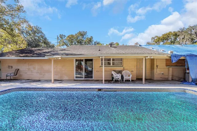 a view of backyard with green space