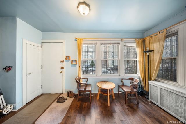 41-71 Gleane Street Queens, NY 11373 - Photo 4 of 28 a view of a dining room with furniture window and wooden floor