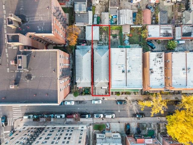 41-71 Gleane Street Queens, NY 11373 - Photo 9 of 28 a city street filled with lots of tall buildings