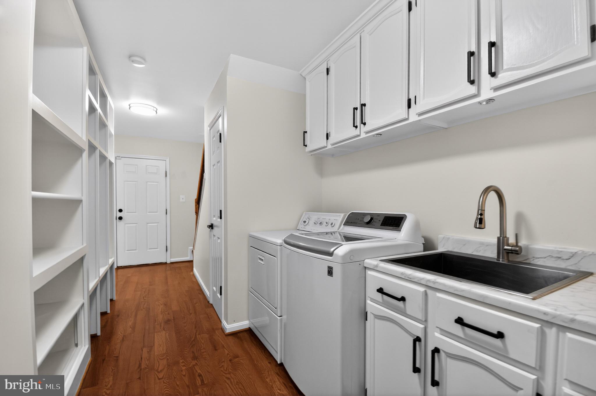 11728 Stuart Mill Road Oakton, VA 22124 - Photo 42 of 68 Bright and functional laundry space.