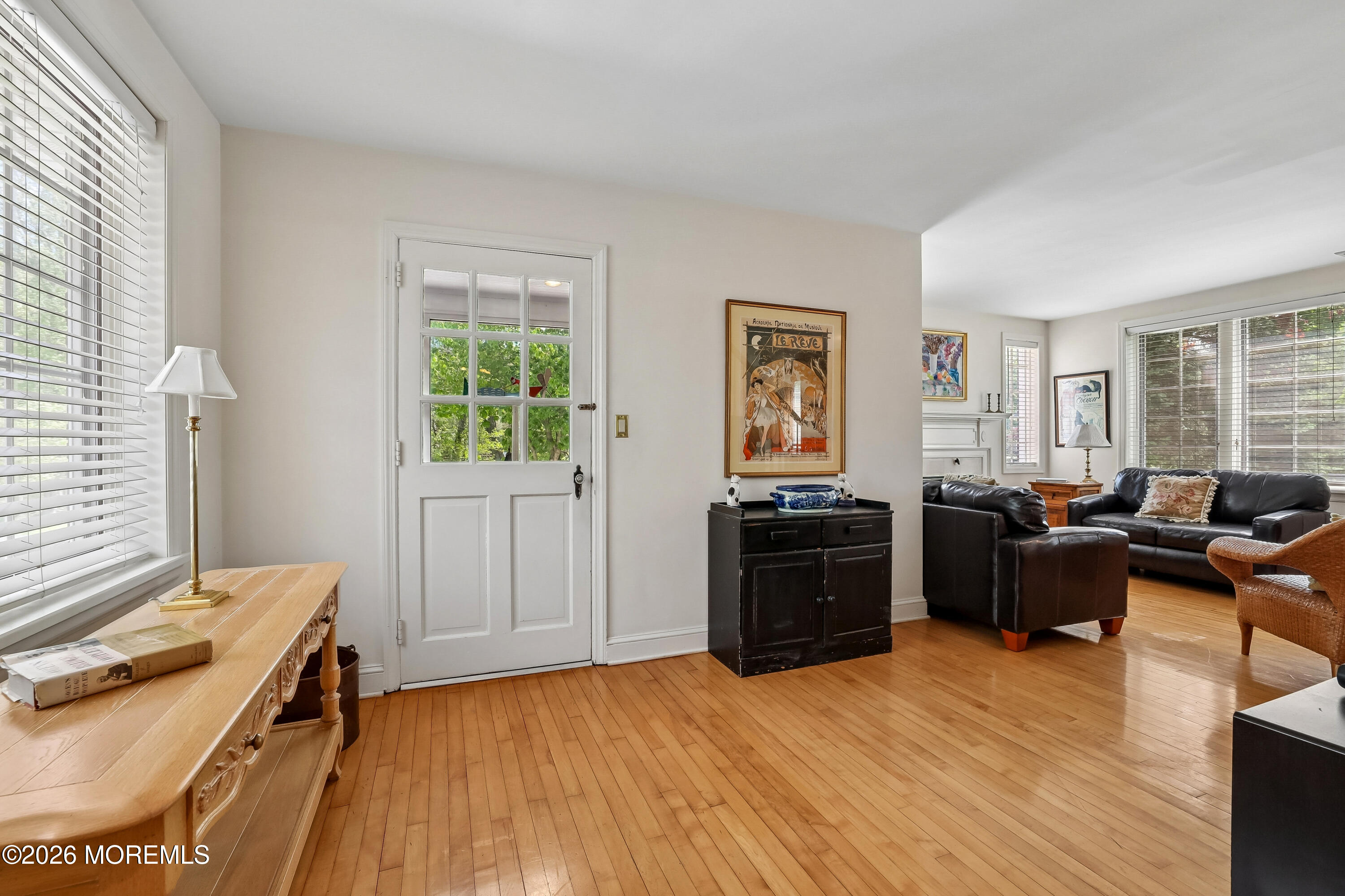 187 Hockhockson Road Colts Neck, NJ 07722 - Photo 23 of 55 a living room with furniture window and wooden floor