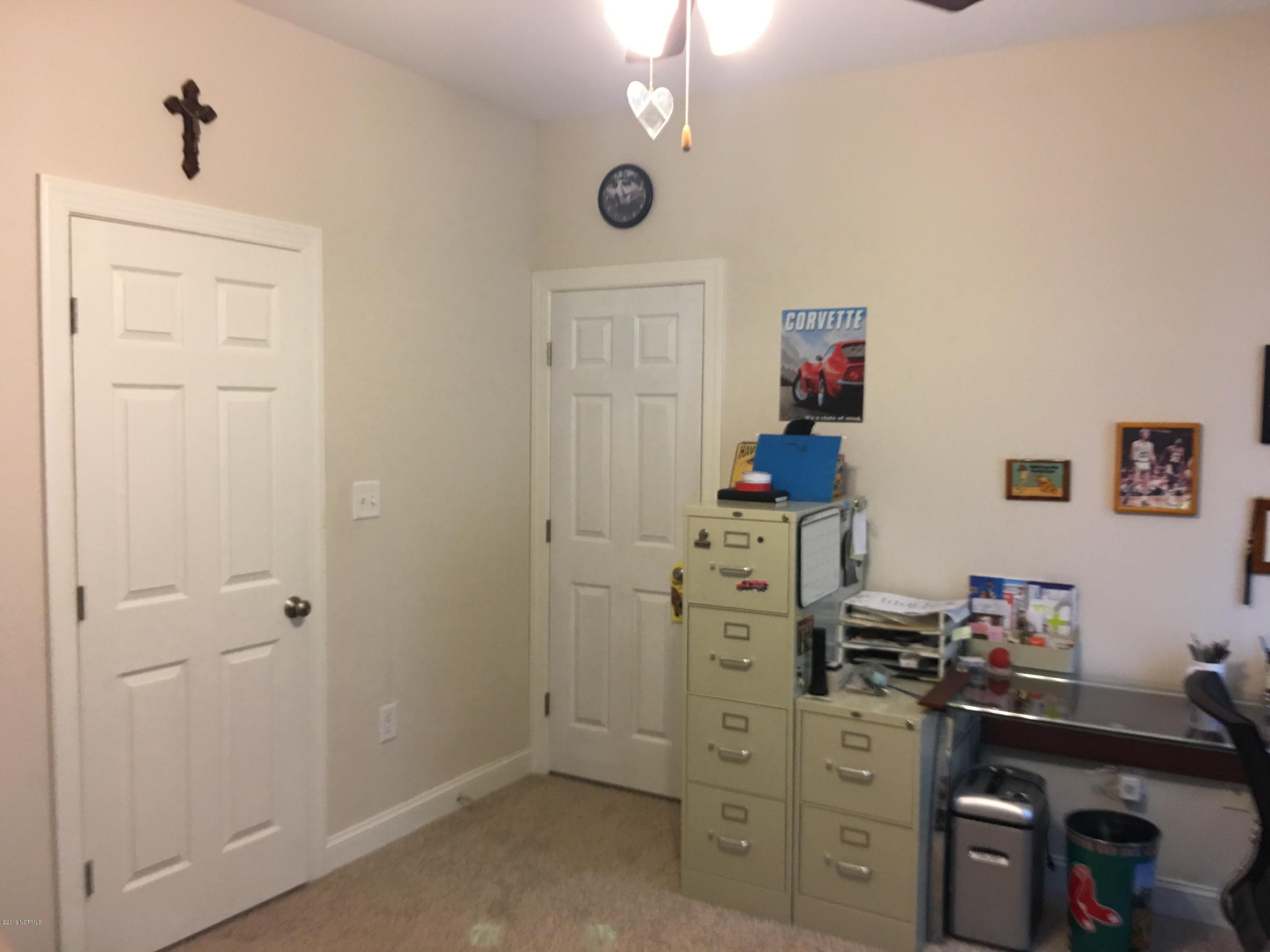 5953 Countryside Road Wilson, NC 27896 - Photo 28 of 39 SECONDARY BEDROOM 1