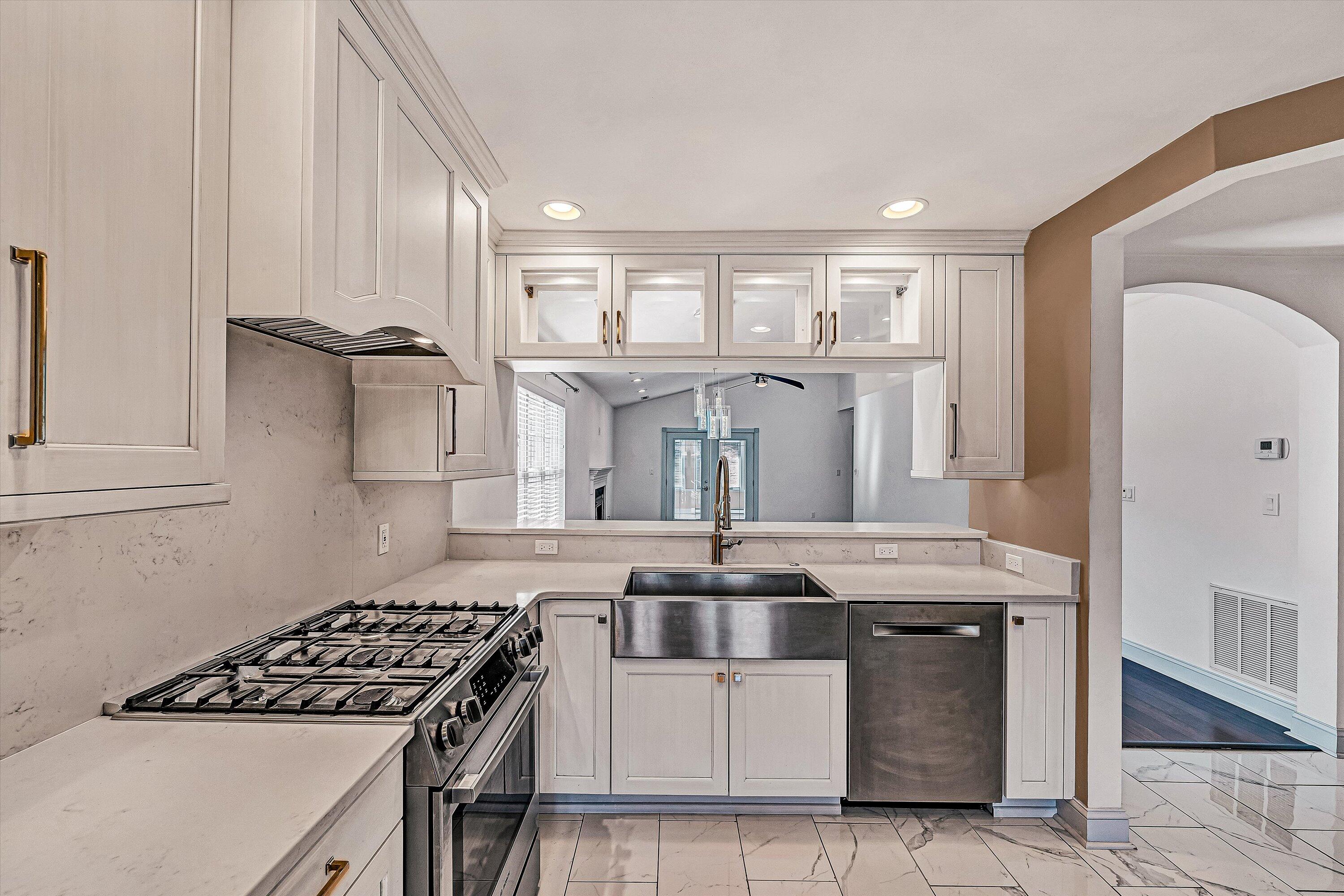 4530 Colonial Pl Drive Roanoke, VA 24018 - Photo 10 of 39 a kitchen with granite countertop a stove and a refrigerator