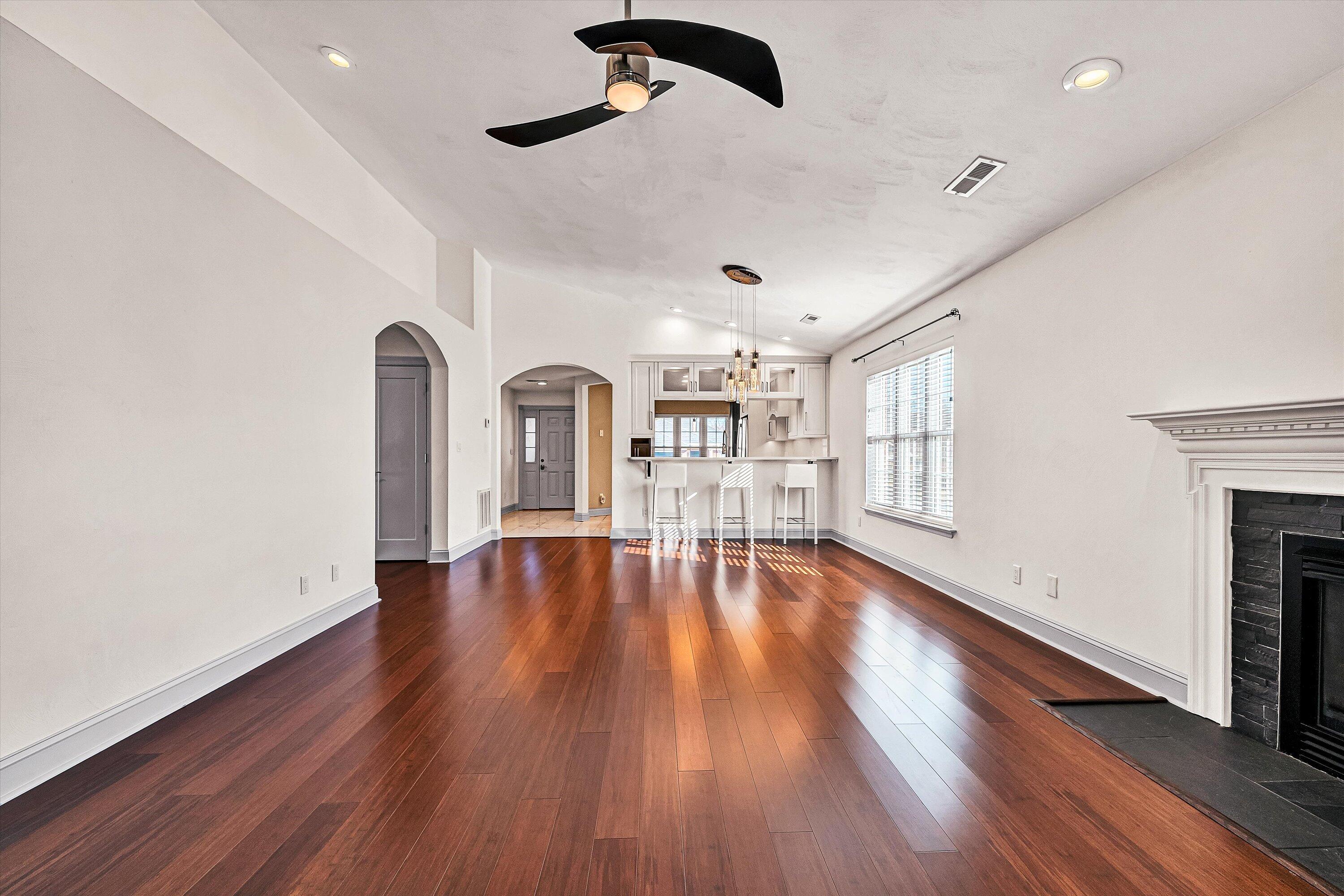 4530 Colonial Pl Drive Roanoke, VA 24018 - Photo 13 of 39 a view of empty room with wooden floor and fireplace