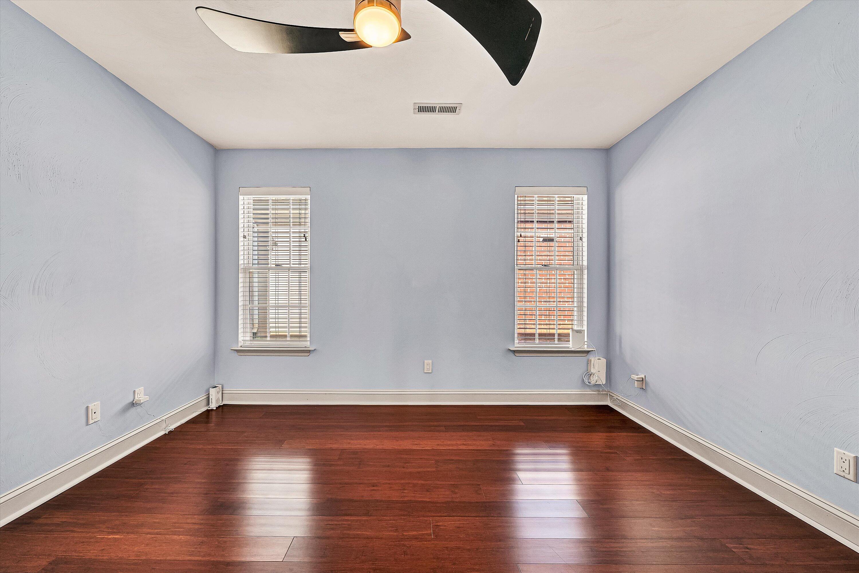 4530 Colonial Pl Drive Roanoke, VA 24018 - Photo 16 of 39 an empty room with wooden floor and windows