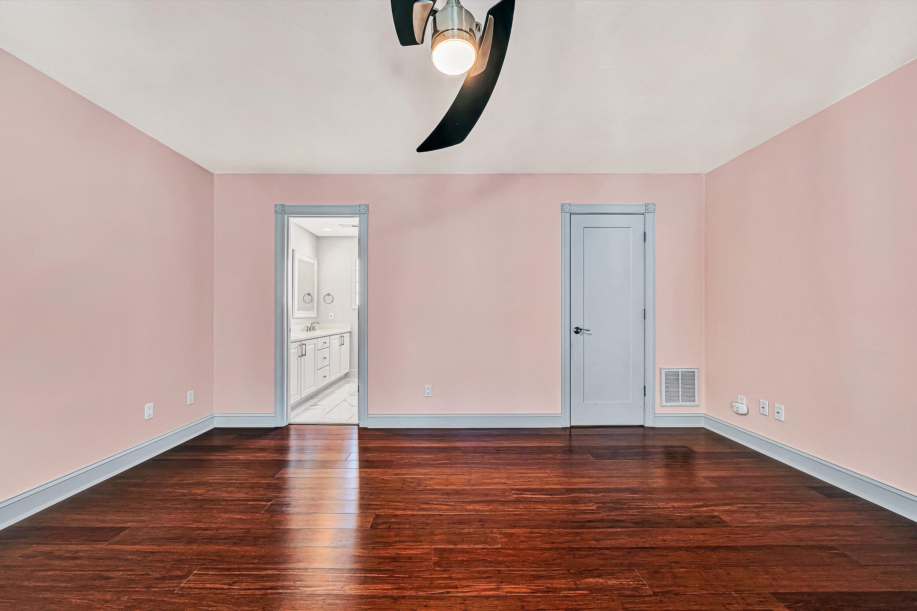 4530 Colonial Pl Drive Roanoke, VA 24018 - Photo 27 of 39 a view of an empty room with wooden floor and a window