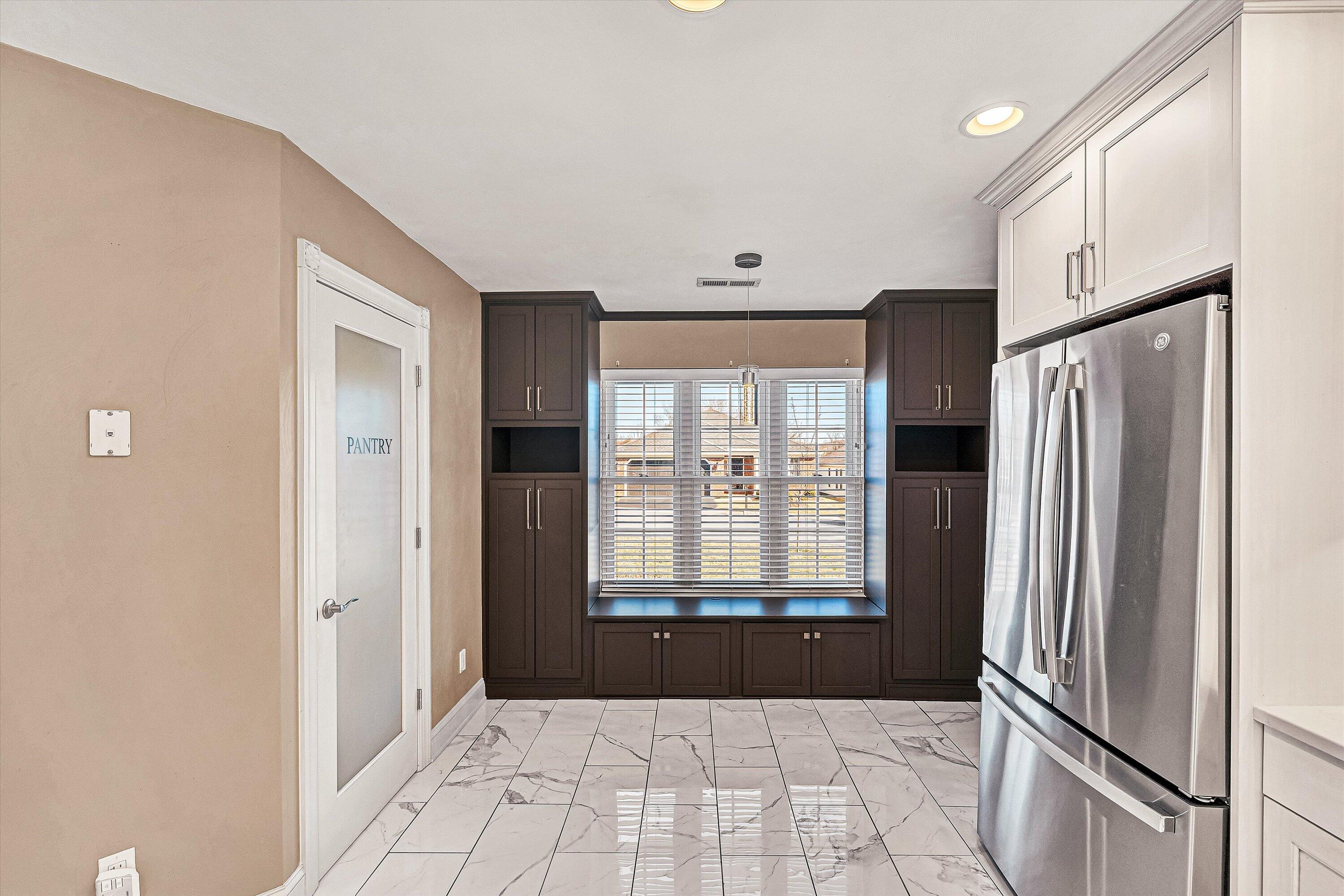4530 Colonial Pl Drive Roanoke, VA 24018 - Photo 5 of 39 a view of kitchen with windows and refrigerator
